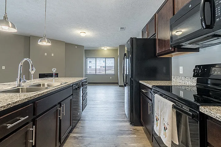 Enjoy the convenience of a spacious kitchen with modern appliances and plenty of storage for all your cooking needs.