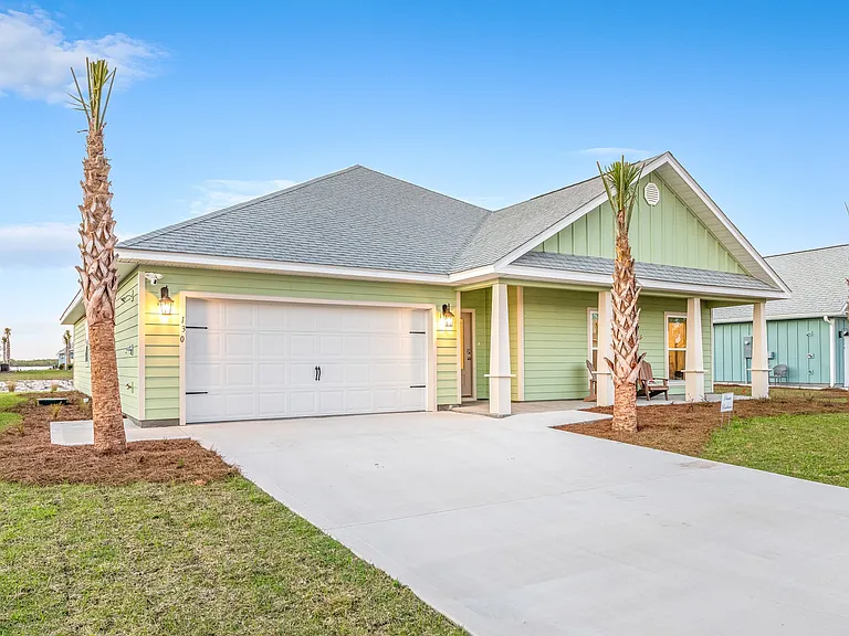 The home provides a view from the front porch of the Town Center lit up beautifully at night. Come relax on the front porch.