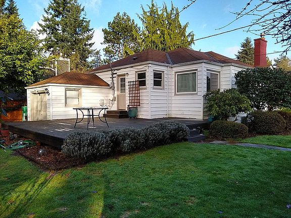 Large sun filled deck, faces south and west.