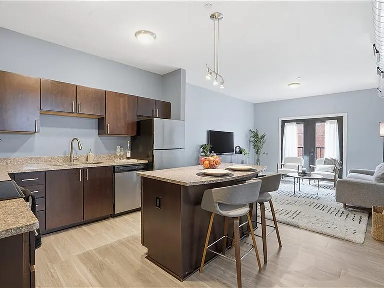 Full kitchen, sink, refridgerator, microwave, stove and dishwasher