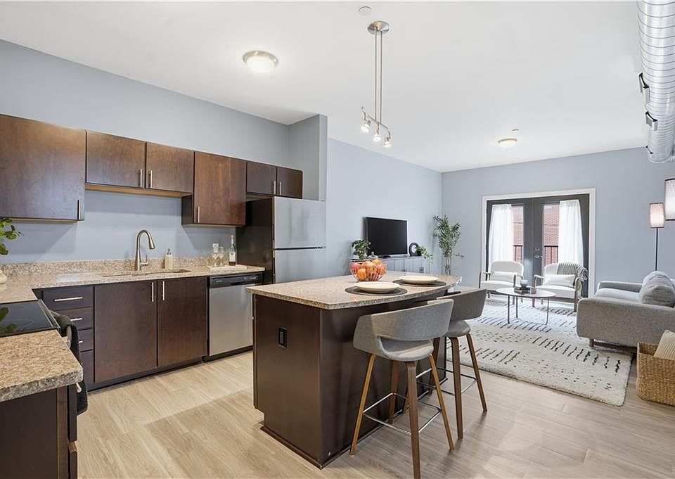 Full kitchen, sink, refridgerator, microwave, stove and dishwasher