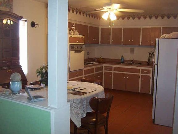 Huge eat-in Kitchen with Tiled floor and lots of cabinet space