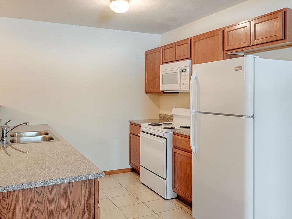 White appliances and Granite Countertops in Select Homes