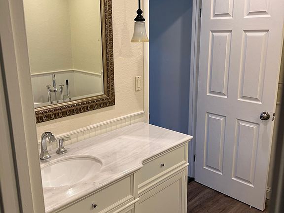 Master bath mirror is beige now newly painted