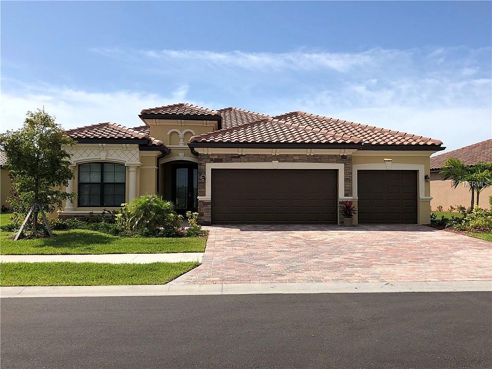 three car garage, front of house