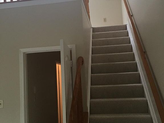 master bedroom: stairs from bedroom to loft