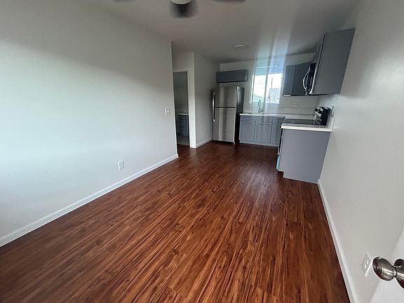 Brand new flooring with full kitchen