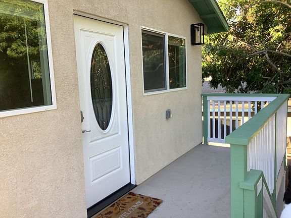 Entry deck and front door and windows.