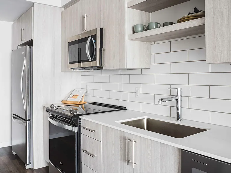 Premium collection homes feature high gloss cabinets and upgraded finishes.