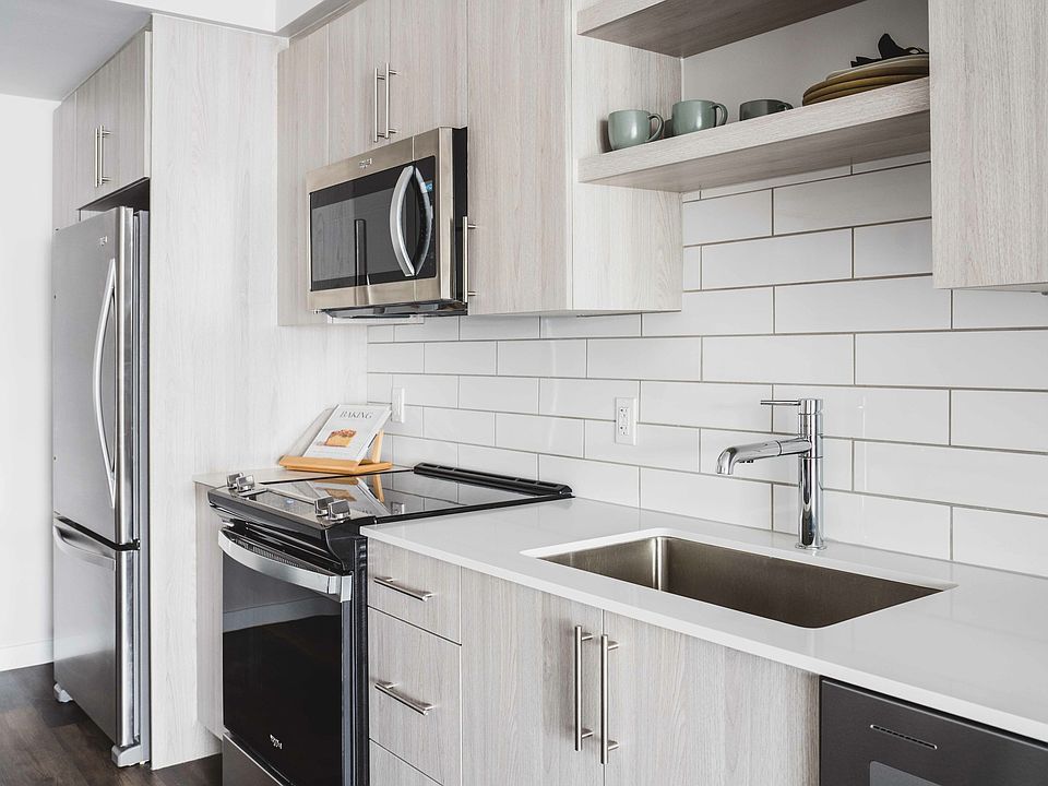 Premium collection homes feature high gloss cabinets and upgraded finishes.