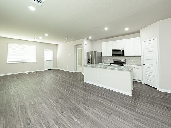 Kitchen, Dining Area, and Family Room