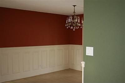Formal dining room, hardwood flooring and nice trim work.