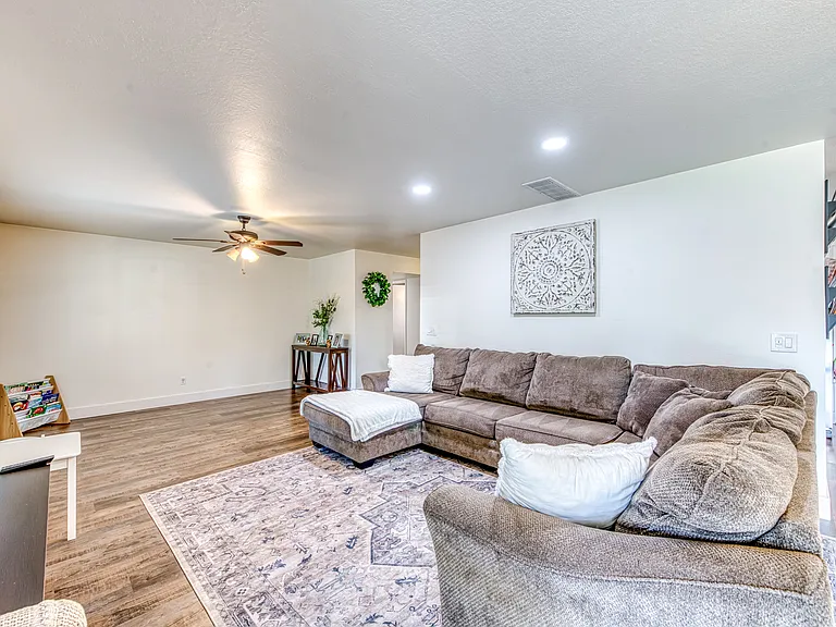 Large living room can accommodate a large sectional and more!