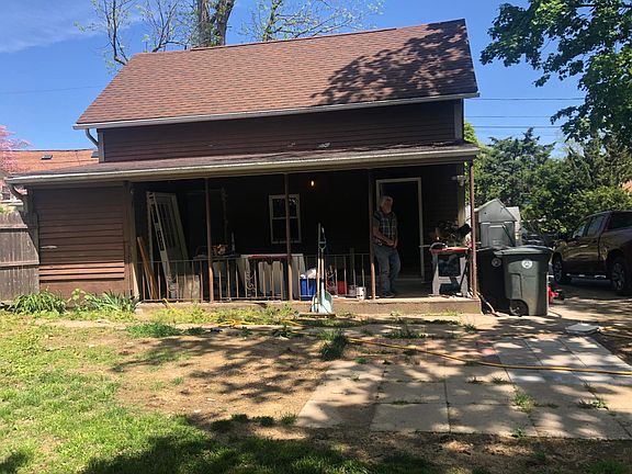 view of back side of house from yard, Farmers Porch & small patio