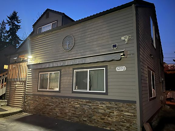 Townhouse Front view. Kitchen windows. Tons of Sun. Unit-2 is on the right side (facing the house)