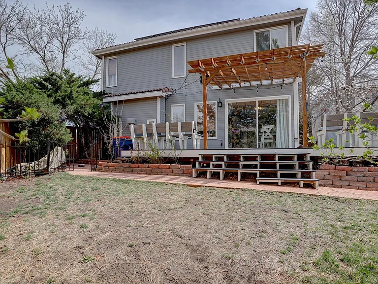 back of home and backyard (new sod coming soon!)
