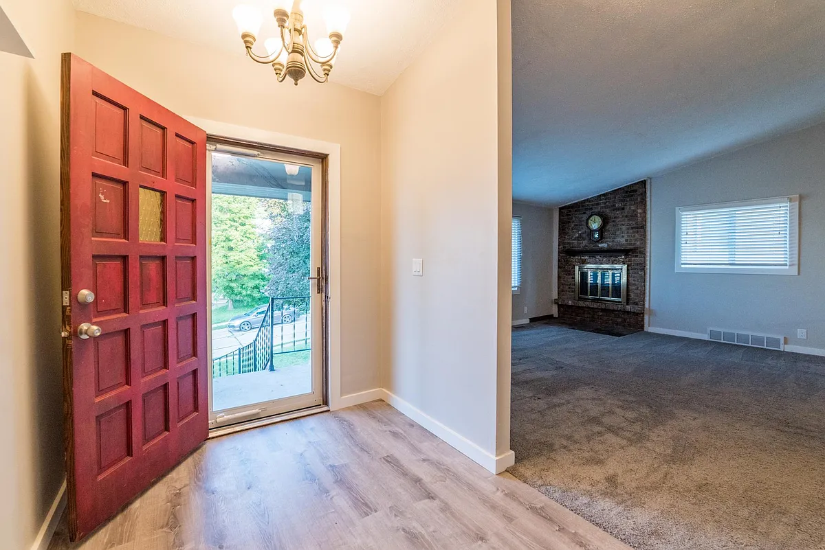 entry and living room - 4716 S 79th Ave