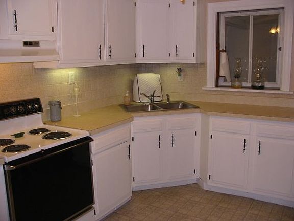 It's got a large eat-in kitchen with stove and refrigerator!  