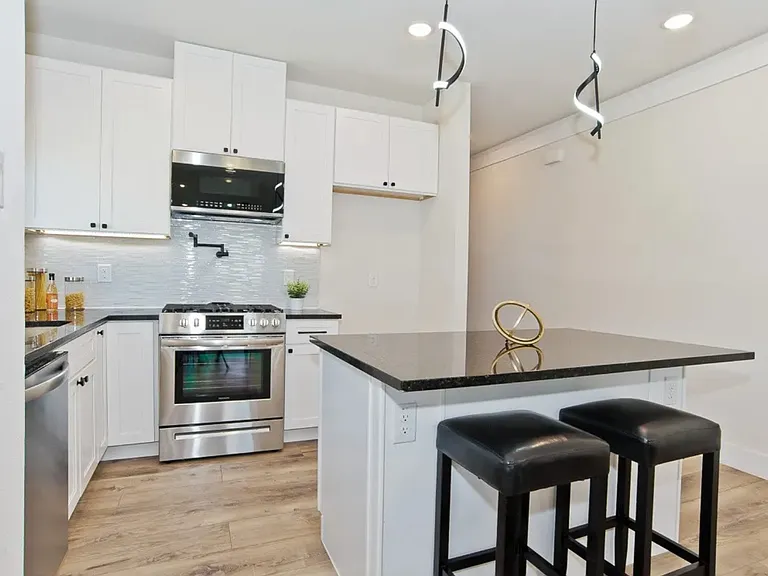 Includes stainless fridge
