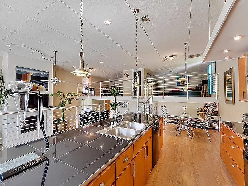Kitchen with adjacent area for a table.