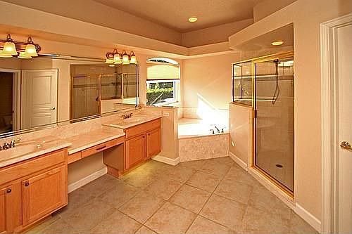 Tiered and Elevated Vanity w/Lighting Underneath! Large Shower w/Tile to the C