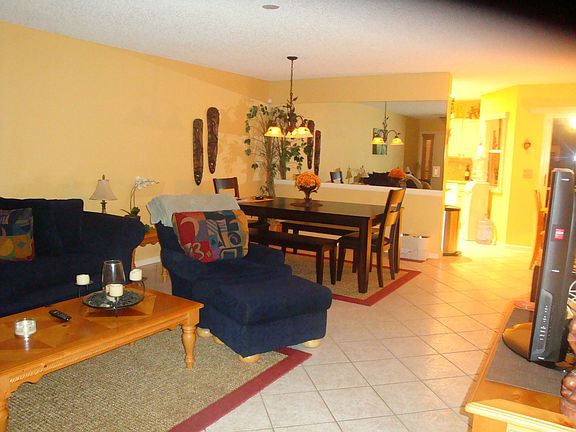 View of living/dining from stairs.