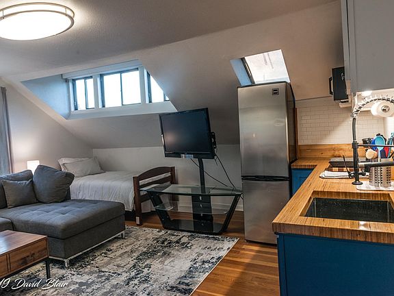 View from doorway to apartment showing bed.