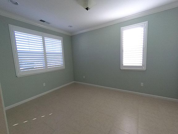 Versatile den (great for a playroom, home office, etc.)
