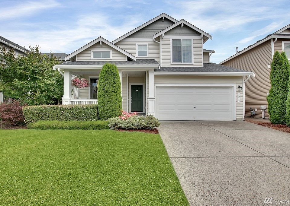 Well maintained landscaping in front & back of home.