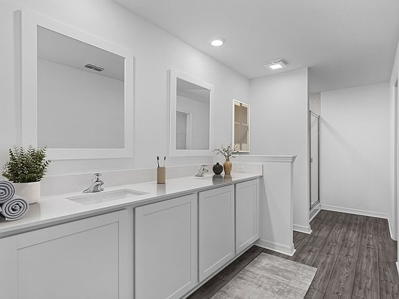 The master bathroom boasts this stunning dual sink vanity.