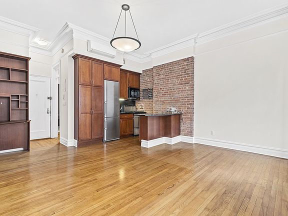 5th image of 411 W 22nd St APT 2F