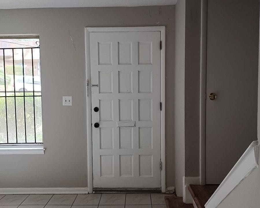 Front door/Stair Closet