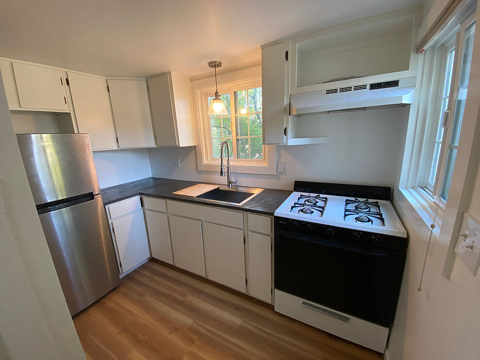 Kitchen with another door to the deck on the right