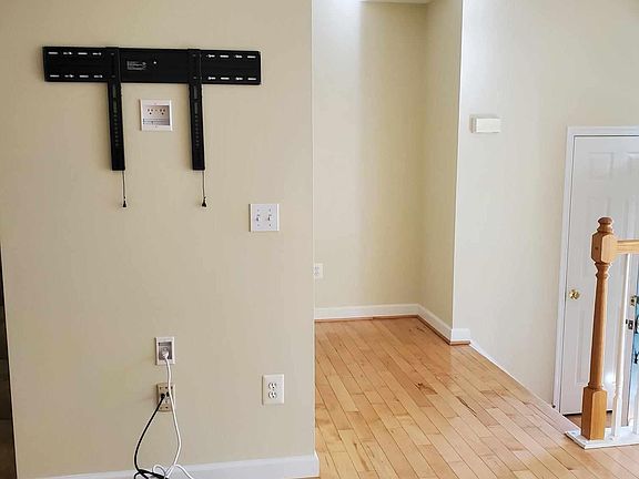 view from living room to front door area