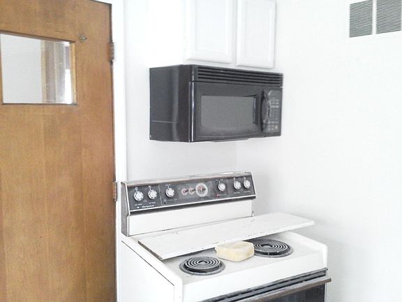 BUILT IN MICROWAVE AND NEW GAS STOVE
