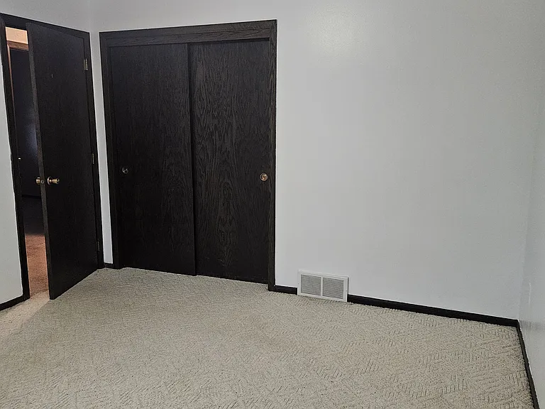 Closet and doorway of bedroom #3
