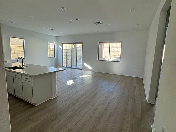 Huge great room with space for separate living and dining areas.