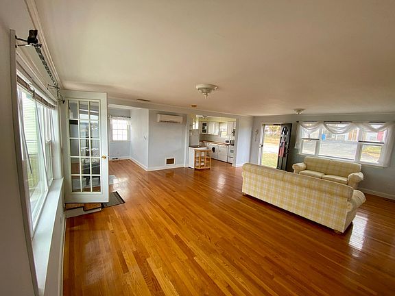 Open plan living room and dining room.