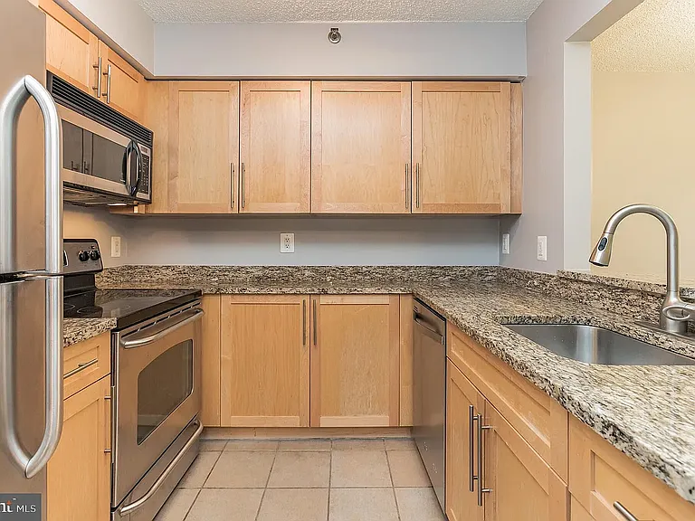 10101 Grosvenor Pl #302 — Photo 14