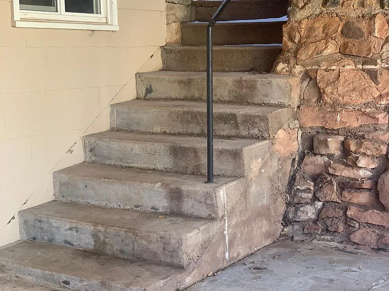 staircase off patio to back yard