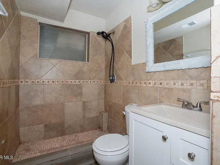 9309 Montgomery Dr — Photo 16