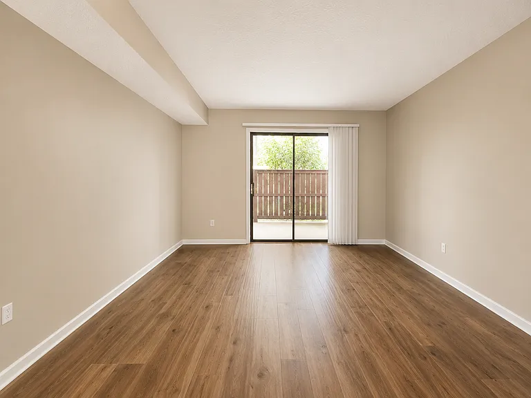 Master bedroom and fenced patio