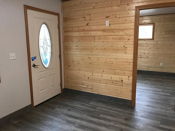 Front door looking into the bedroom.