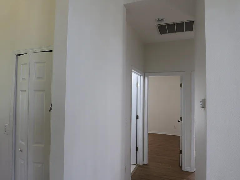 hall way to bedroom 3 & 4, and turn right to garage through laundry room