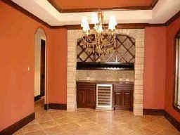 Formal Dining room with stone grotto serving area
