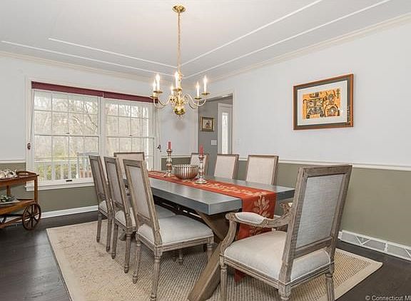 Dining room with chair rail and tray ceiling