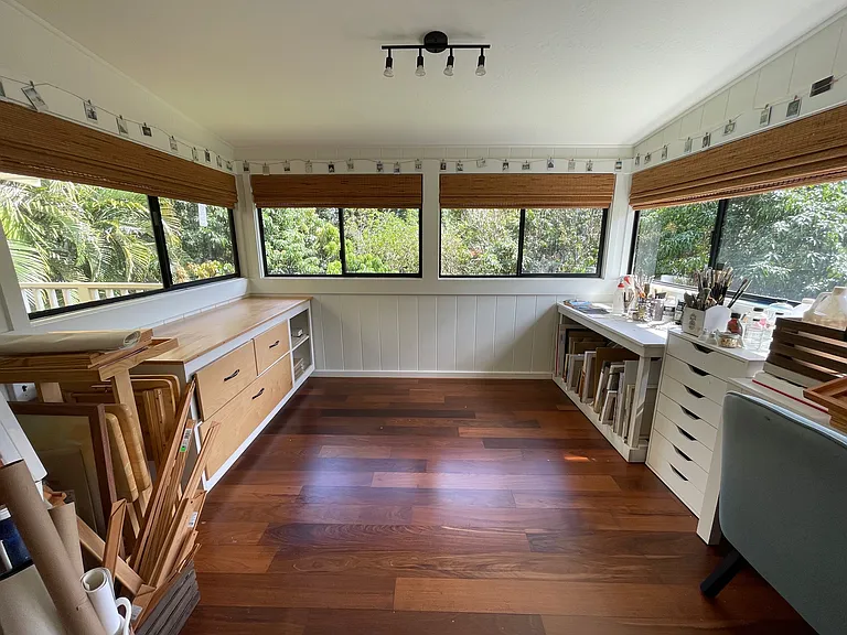 Sunroom overlooks backyard (currently used as an art studio)