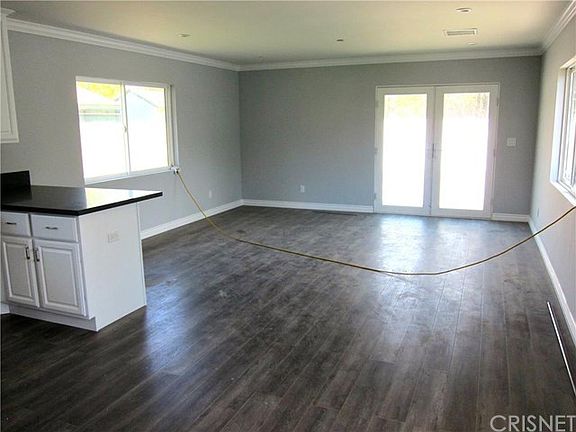 Living room off kitchen is larger than it appears.