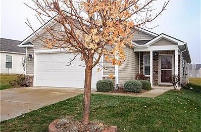 Front of home - Closer shot of the door/Side of home.