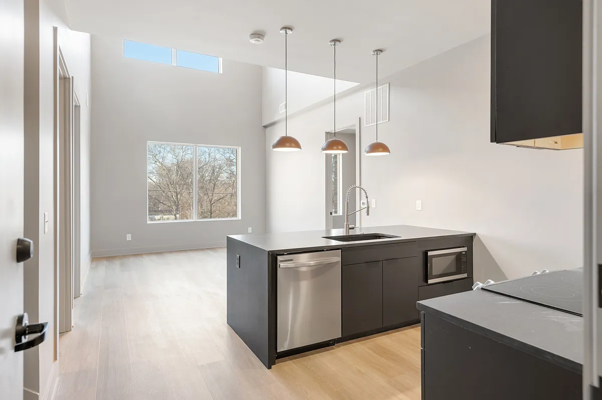 Waterfall edge island and wide plank flooring - 1090 Haysboro Ave #208